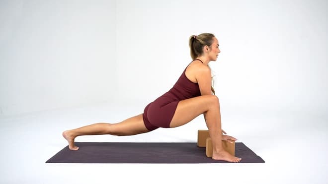 Lizard Lunge demonstrated by a certified trainer
