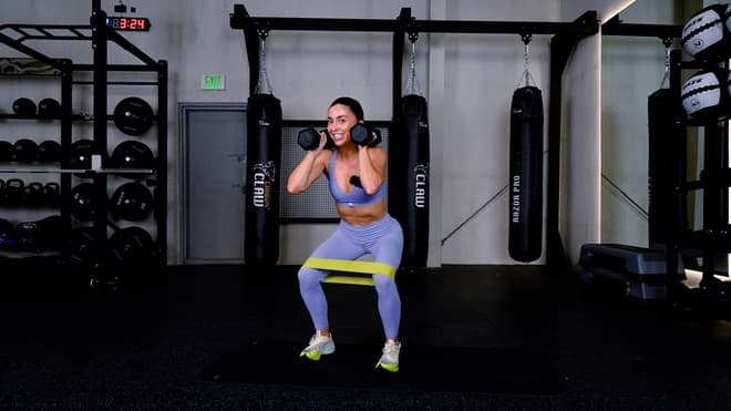 Overhead Knee Raise demonstrated by Sophie Jones