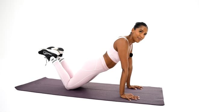 Crunches demonstrated by Mish Naidoo